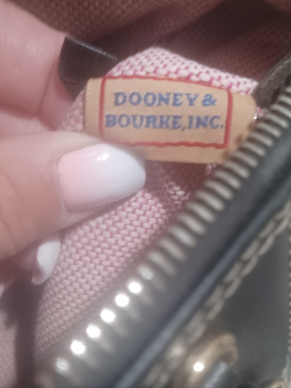 Dooney & Bourke VINTAGE Bag WITH CHARM, 11x7 slight stain and fading on bottom. - Picture 10 of 11